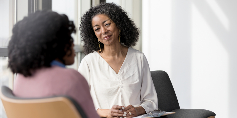 Image of two people in a counselling session