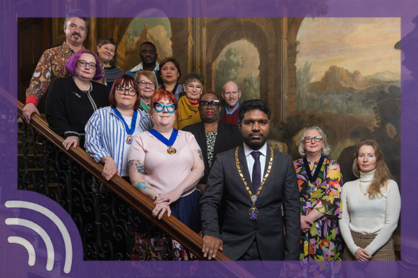 14 members of RCN Council standing on a staircase