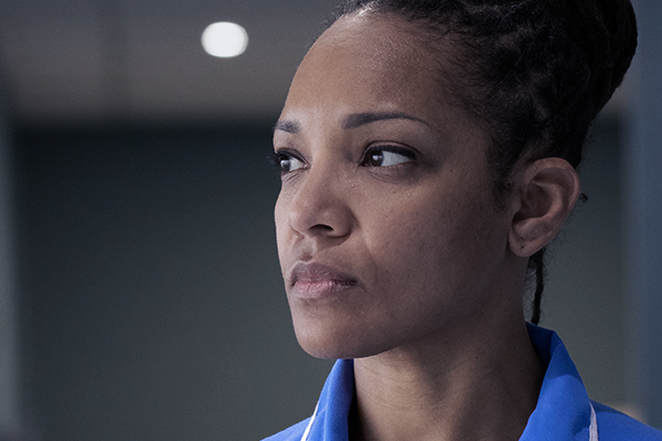 A nurse looking off to the side