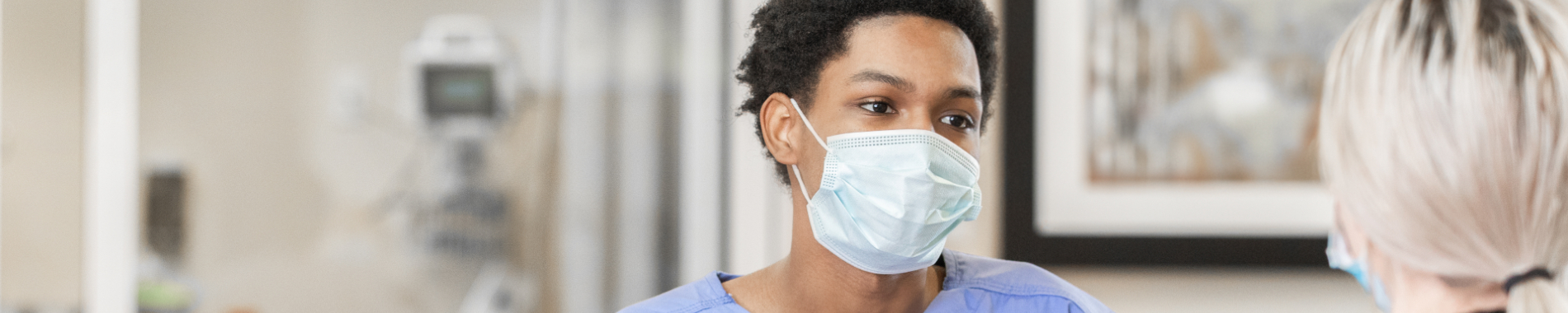 Two nurses in conversation