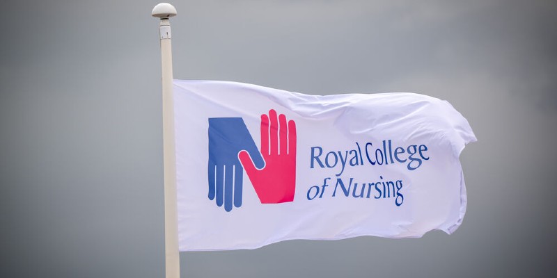 Flag, featuring a white background and the RCN logo, with text saying Royal College of Nursing