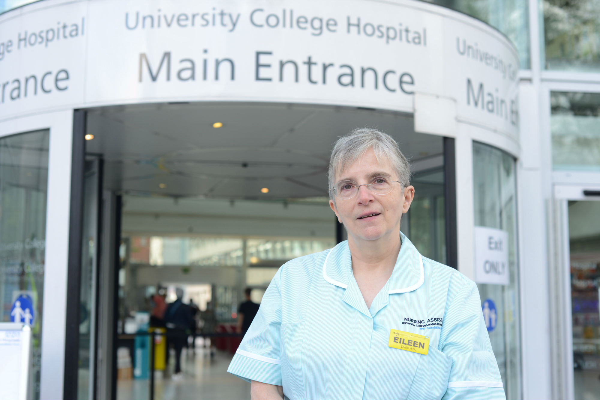 Eileen outside her workplace