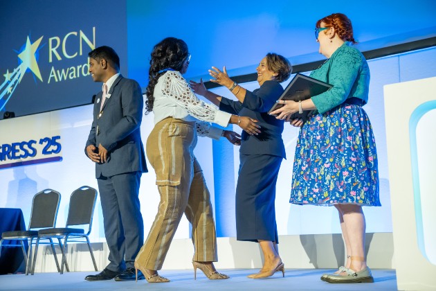 Nicola Ranger and Bejoy Sebastian on stage at RCN Awards 2025