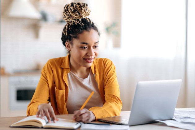 Woman working at a laptop