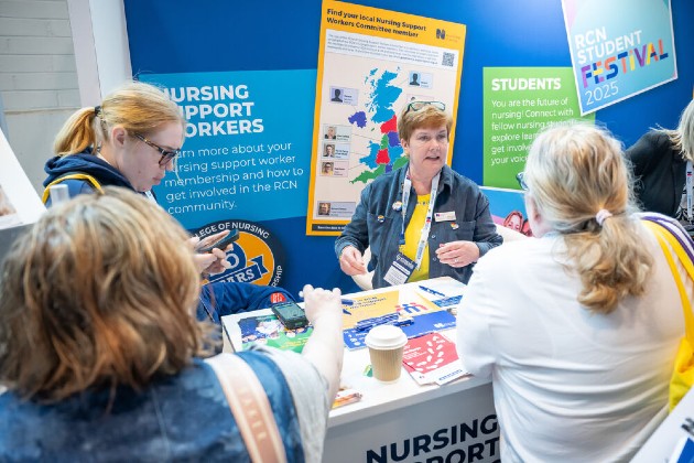 Sharon Mitchel speaks to delegates from RCN Congress stand