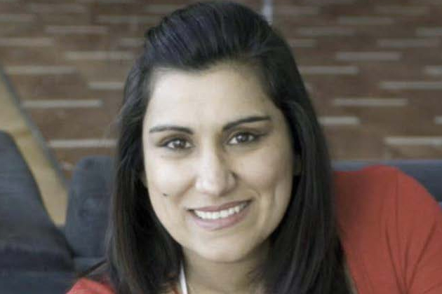 Close up of Dame Jasvinder Sanghera smiling at the camera