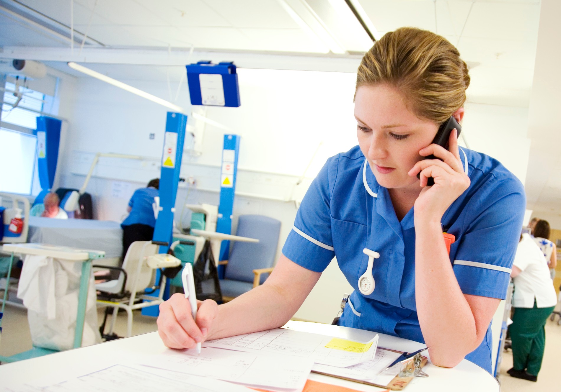 Nurse on phone at desk