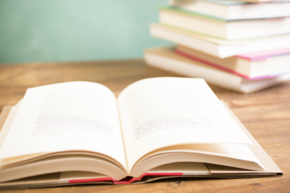 Books open for studying for nurse CPD