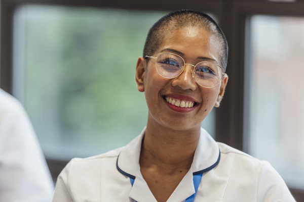 A smiling member of nursing staff