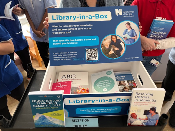 The Library-in-a-Box opening and showing different books.