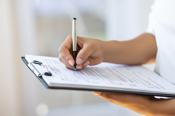 A person checking items off a list